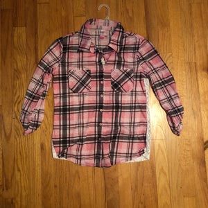 Woman’s plaid blouse